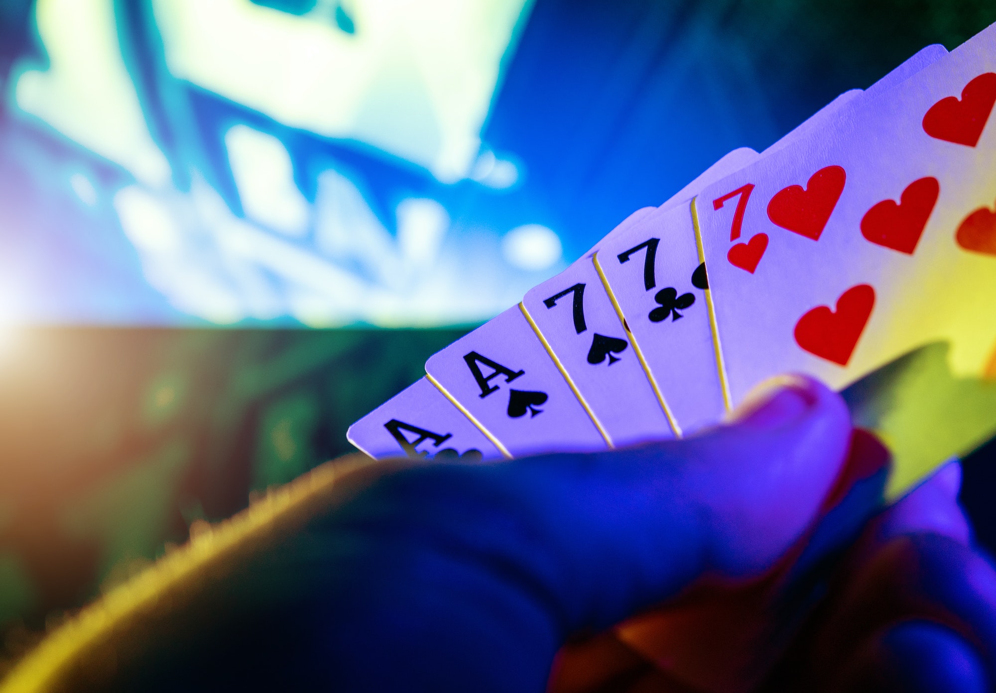 poker-game-cards-in-players-hand.jpg